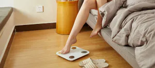 foot on weight scale