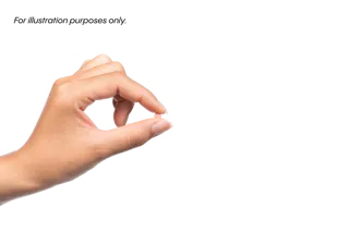 A hand holding a small pill between the thumb and forefinger against a black background.