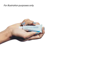 A hand holding a tube of Tretinoin 0.025% cream against a black background.