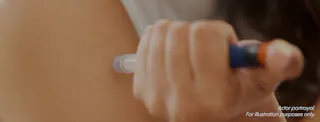 Person injecting GLP1 medication