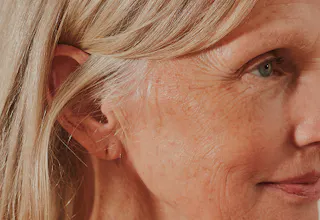 Middle aged women looking off in distance