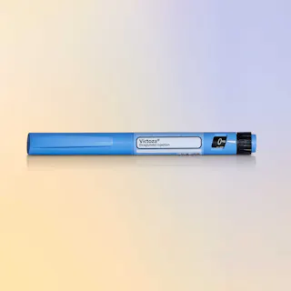 Victoza GLP1 injectable pen against a gradient background