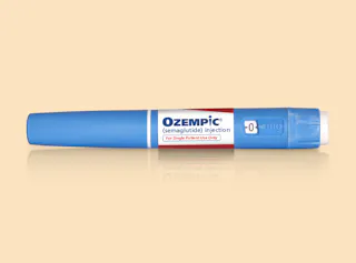 Ozempic GLP1 injectable pen against a gradient background