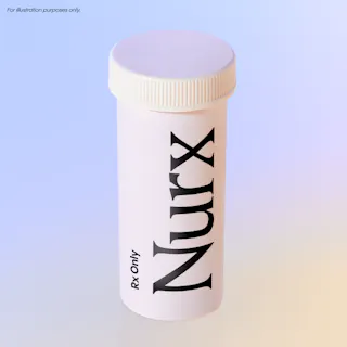 A white prescription pill bottle labeled 